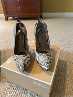 Snake skin pumps by Maxaria